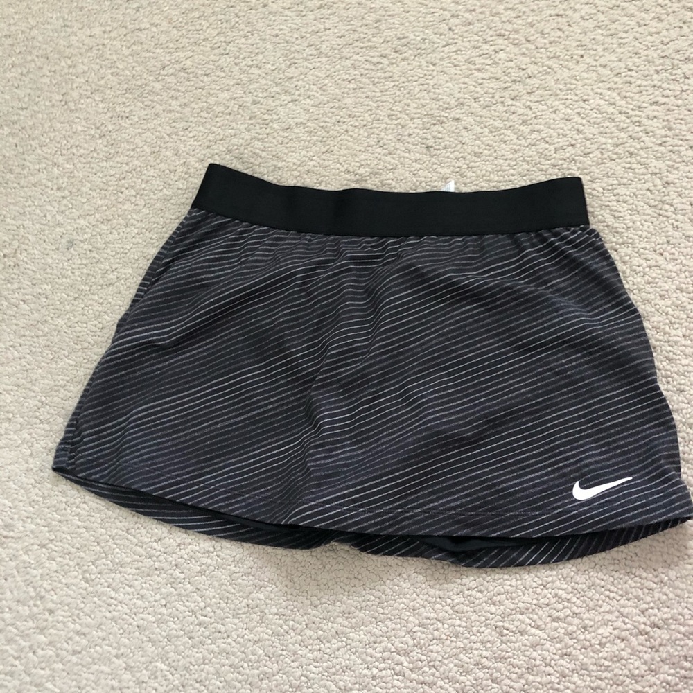 Black and grey Nike tennis skirts